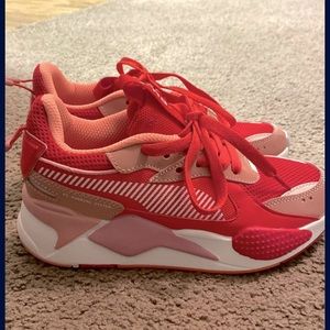 Never used before. Puma runs half size smaller so I got stuck with these. New.